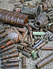 Military background with cartridges of grenades and machine-gun tape. Black archeology. World War II and its artifacts. Great Patriotic War of the USSR