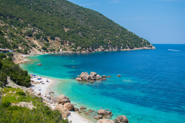 Fototapeta na wymiar Vouti beach in Kefalonia ionian island, Greece. A secluded majestic beach with turquoise sea waters