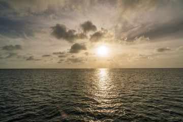 Fototapeta na wymiar Sunset on a west coast sail Curacao Views in the caribbean