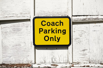 Coach parking only sign
