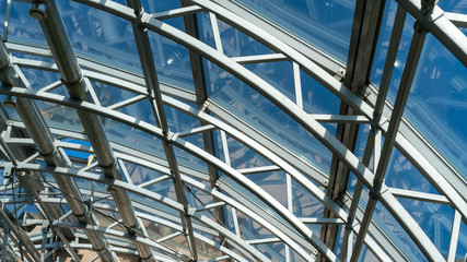 interior of greenhouse in garden with transparent glass roof