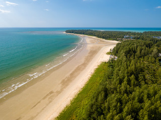 Aerial drone view of a beautiful, empty tropical sandy beach in Thailand (Memories Beach)