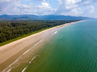 Aerial drone view of a beautiful, empty tropical sandy beach in Thailand (Memories Beach)