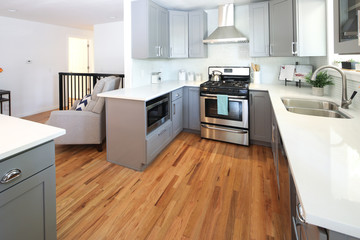 Stunning kitchen design with grey cabinets.