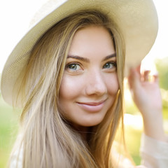 Outdoors portrait of delightful young woman