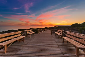 Photo sur Plexiglas Mer / coucher de soleil Wooden path near the sea