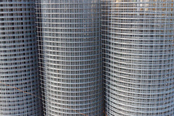 Metal mesh for construction wound into a roll © Viktoriya09