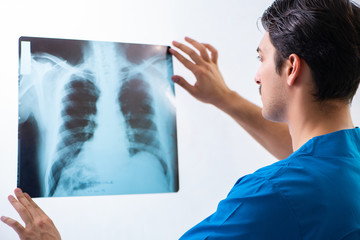 Young handsome doctor radiologyst working in hospital   