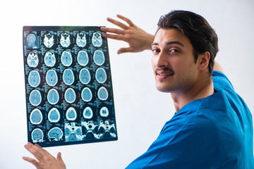 Young handsome doctor radiologyst working in hospital   