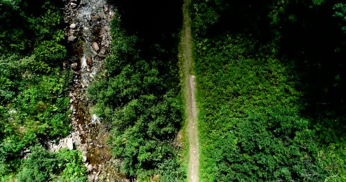 Drone flight in summer over mountain stream in the Nockberge mountains in the Thunder Gorge in Carinthia in innerkrems, lungau, schoenfeld