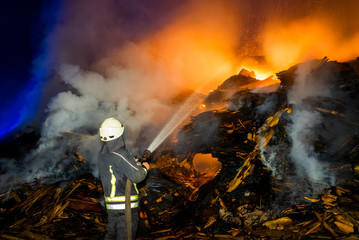firefighters working at night incident