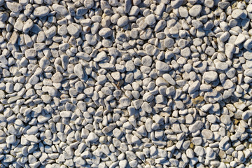 stone pebbles for decorative dusting of lawns and sidewalks in landscape design