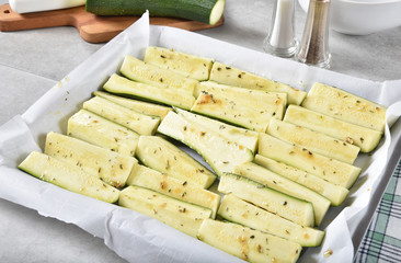 Zucchini wedges in a baking ban