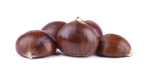 Fresh chestnuts with peeled roasted chestnut isolated on white background. Hippocastanum isolated