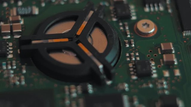 Electronic Board Of The Old Hard Disk In Motion