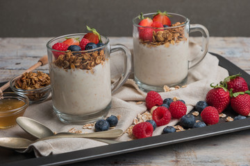 Breakfast parfait with homemade granola, fresh fruits and yogurt