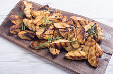 Homemade grilled potatoes with rosemary