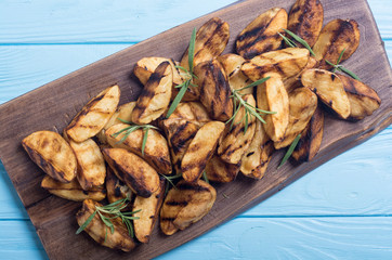 Homemade grilled potatoes with rosemary