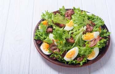Fresh salad with bacon