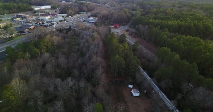 Aerial, train passes into town of Aberdeen