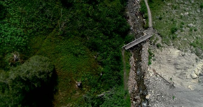 Drone flight in summer over mountain stream in the Nockberge mountains in the Thunder Gorge in Carinthia in innerkrems, lungau, schoenfeld