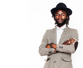 young handsome afro american boy in stylish hipster hat gesturin