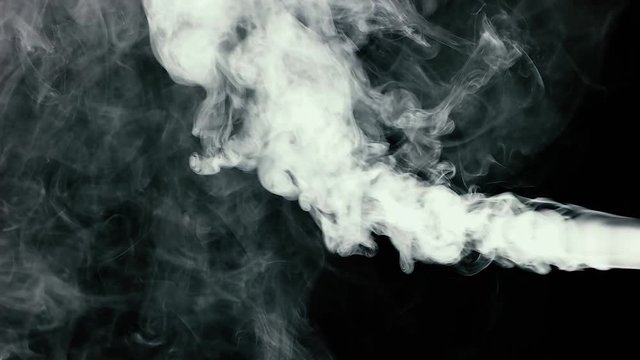 light smoke or steam on a dark isolated background