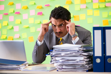 Businessman having trouble with his priorities