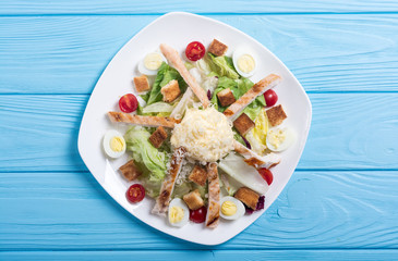 Salad ceasar with chicken , eggs and tomatoes