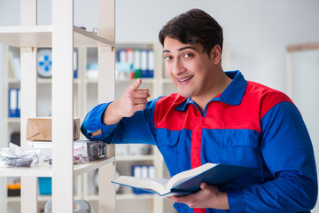 Man working in the postal warehouse