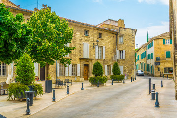 View of a narrow street in the center of Villeneuve les Avignon, France - obrazy, fototapety, plakaty