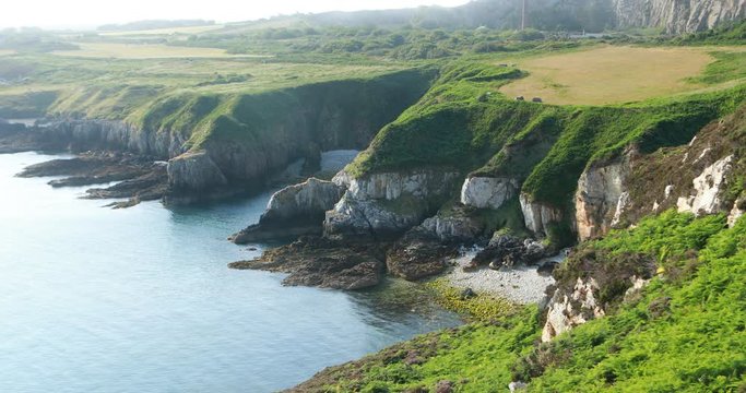 Holy Iland coast line in sun.