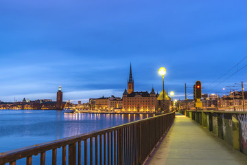 Stockholm night city skyline at Gamla Stan and Slussen, Stockholm Sweden