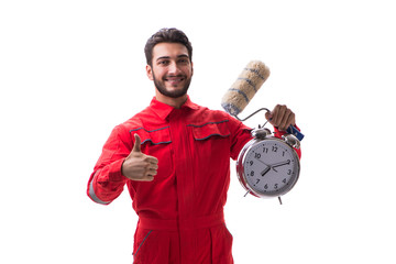 Young handsome painter with paintbrush isolated on white in time