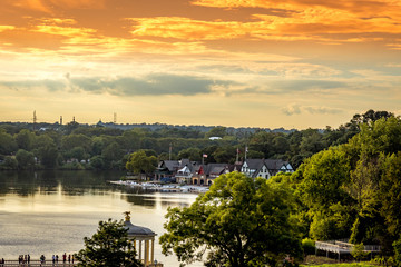 Philadelphia city skyline at sunset across Schuylkill river
