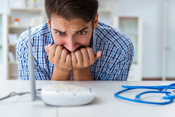 Frustrated young man due to weak internet reception