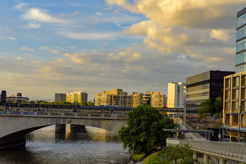 Philadelphia city skyline at sunset across Schuylkill river