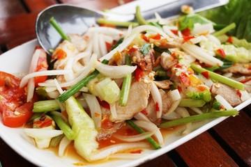 Close up spicy grilled pork salad