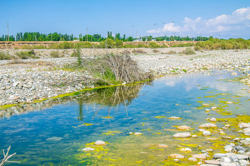 The dried up mountain river valley landscape