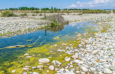The dried up mountain river valley landscape