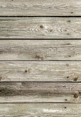 Old wooden planks in a fence as an abstract background