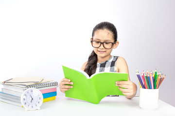 Cute asian girl enjoying her study ,reading book prepare on her exam