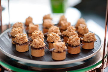 buffet food, catering food party at restaurant, mini canapes, snacks and appetizers