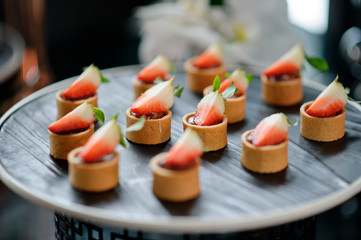 buffet food, catering food party at restaurant, mini canapes, snacks and appetizers
