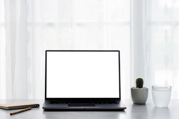 Office desk table with laptop computer, supplies with copy space in the office.