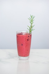 Smoothie with Berry, black currant and red currant in the glass