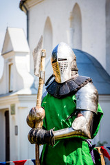 Knight in a combat armor before begins the battle _