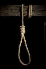 Rope from a rope on a wooden crossbeam
