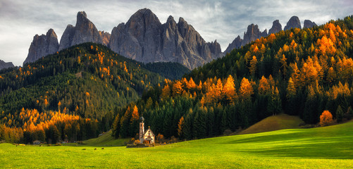 Santa Maddalena (St Magdalena) village with magical Dolomites mountains in background, Val di Funes...
