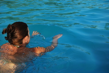 Girl Swiiming in Pool